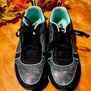 Womens size 8 Skechers. Very unusal. Black with multi shine.